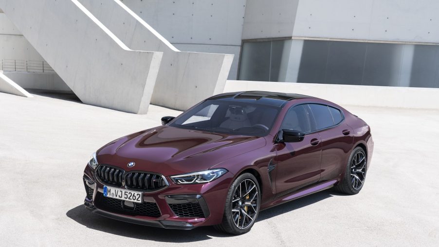 A high-angle photo of a maroon BMW M8 GC