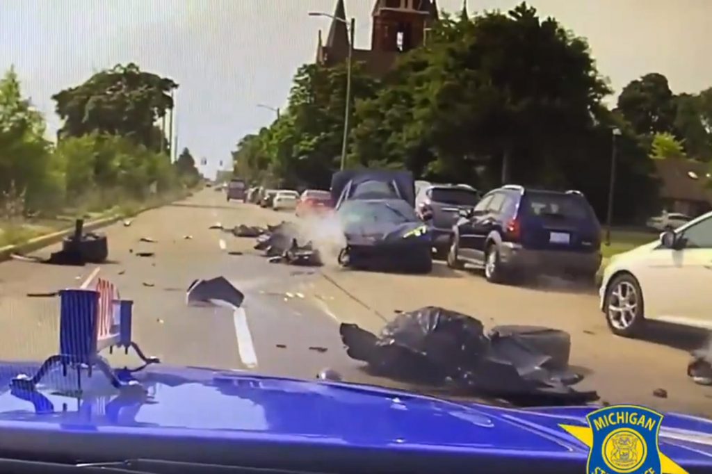dash cam shot of Police chase of 2021 C8 Corvette in accident