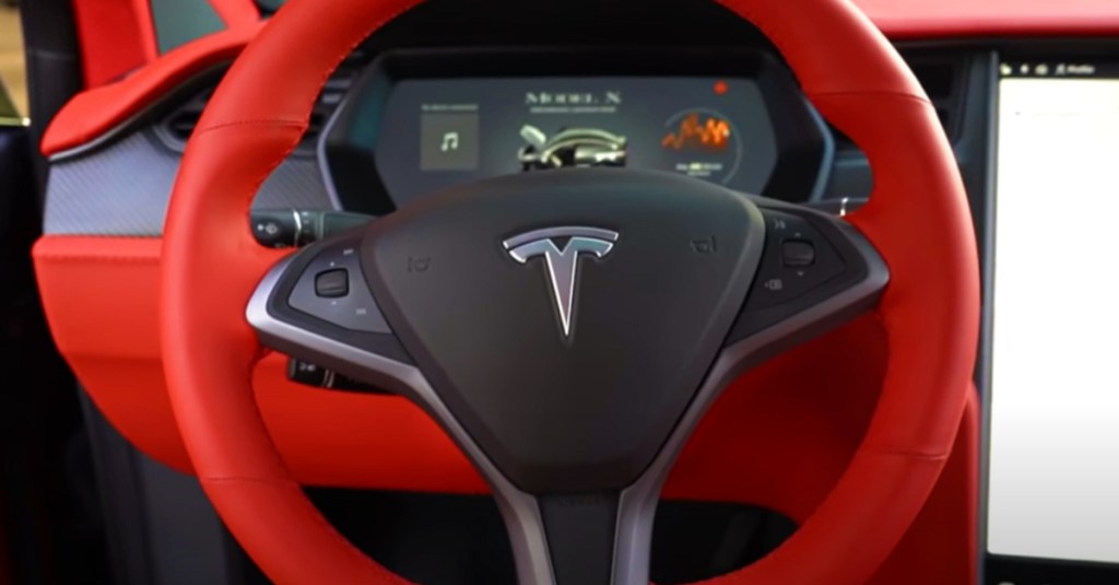 The interior of Quavo's custom red Tesla Model X. 