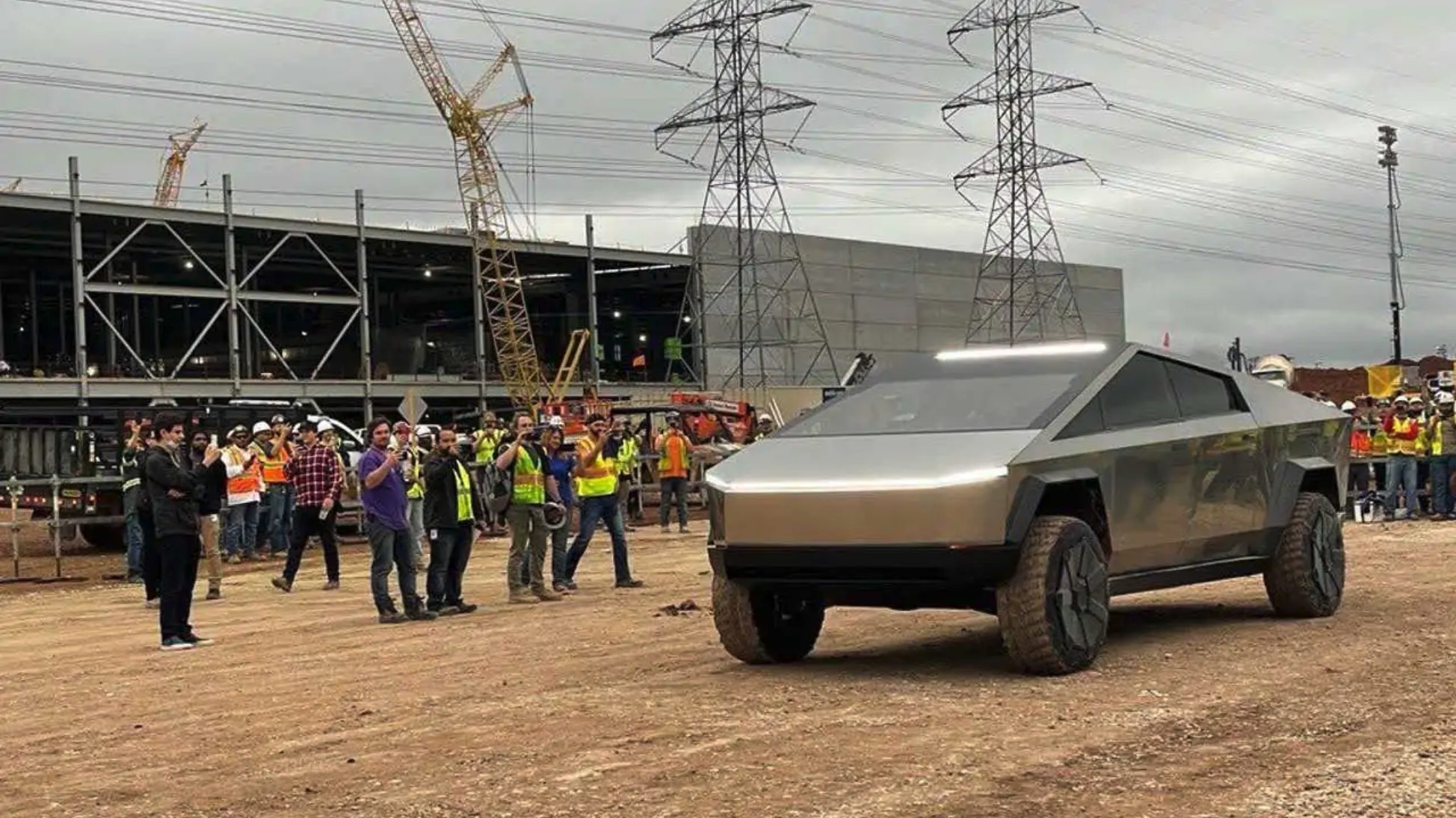 The 2021 Tesla Cybertruck at a construction site like a work truck