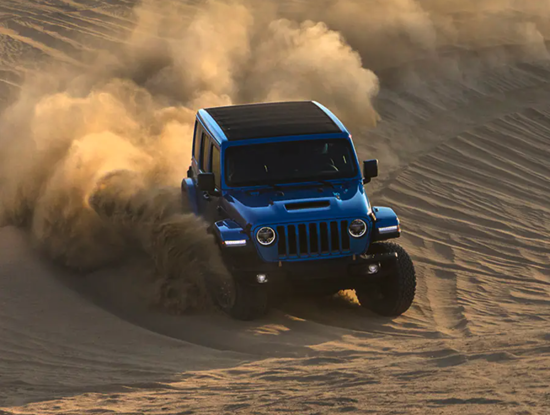 Jeep Wrangler ripping through the sand shows that its ready for some competition from the 2021 Ford Bronco