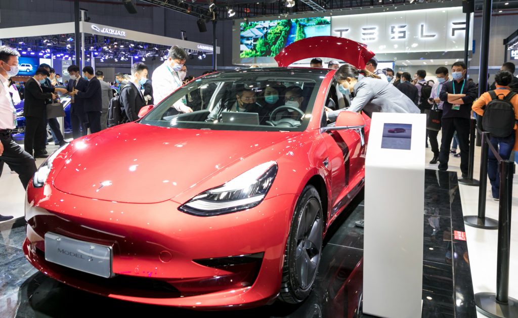 A red Tesla Model 3. 