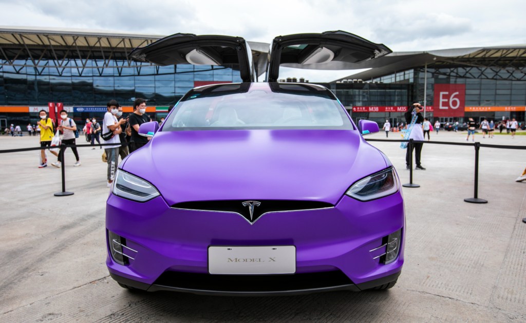 A purple Tesla Model X. 