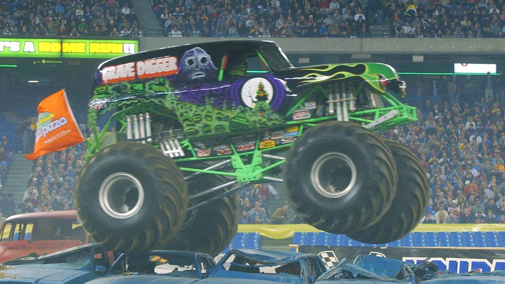 The Grave Digger monster truck crushing cars. 