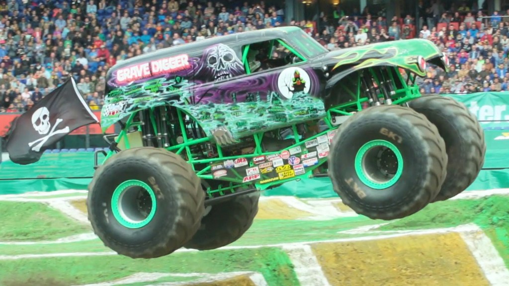 The Grave Digger flying over a dirt mound in front of the 50,000 strong crowd in Rotterdam, July 2016.