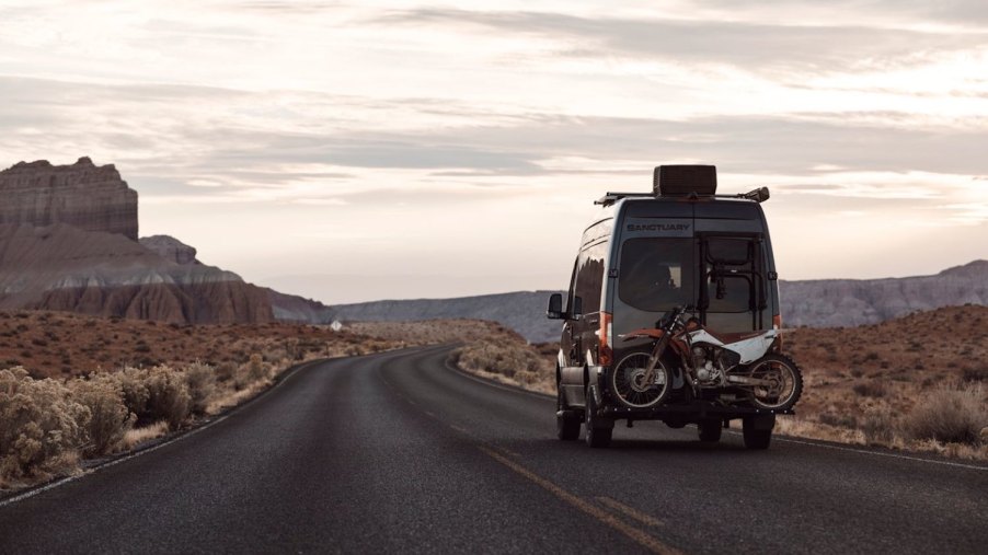 Thor 4x4 Sanctuary camper van with a dirtbike on the back