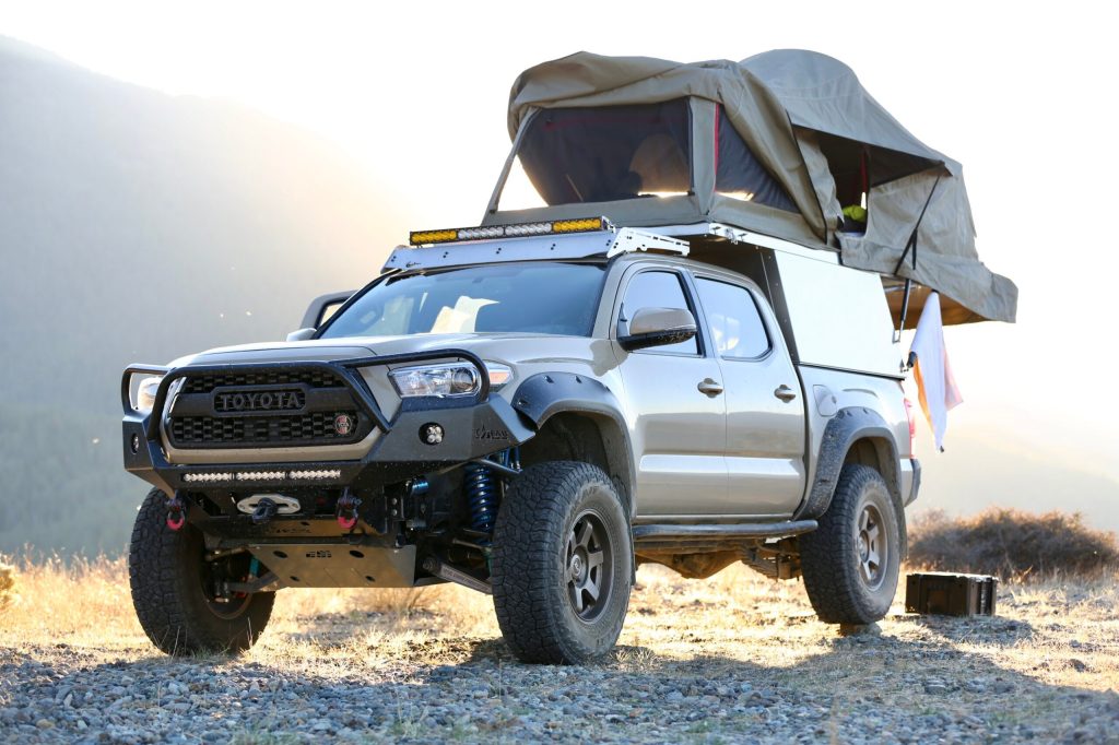 2017 Toyota Tacoma overlanding rig with roof tent set up on top