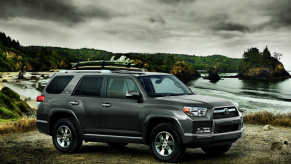 2013 Toyota 4Runner outside with surfboards on top