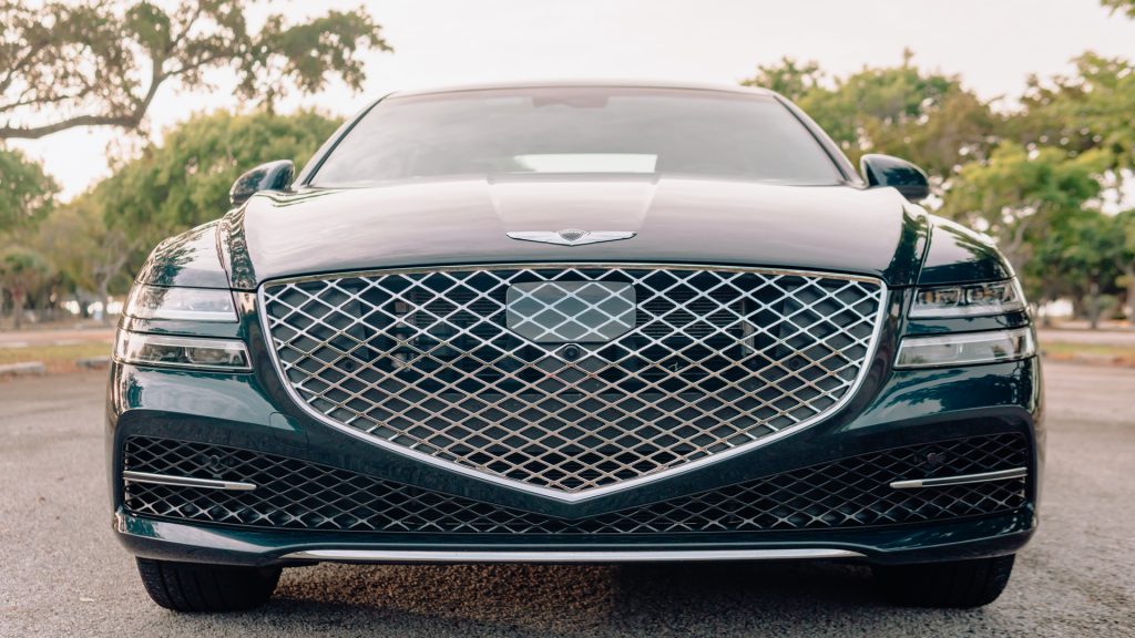 An image of a 2021 Genesis G80 parked outdoors.