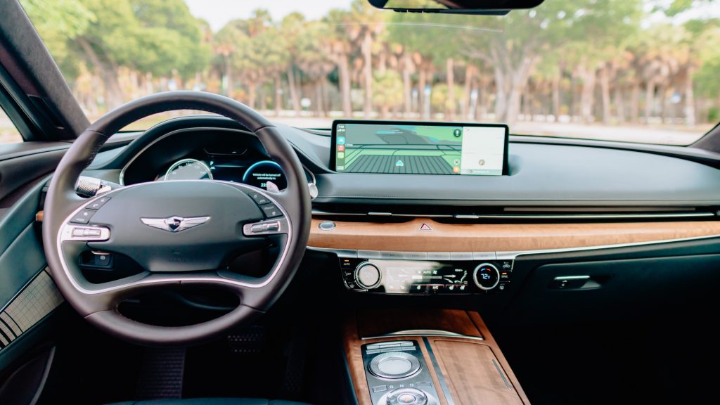 An image of a 2021 Genesis G80 parked outdoors.