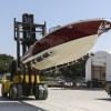 A forklift holds a Launch 27 boat at Winnebago Industries' Chris-Craft manufacturing facility in Sarasota, Florida, in June 2018