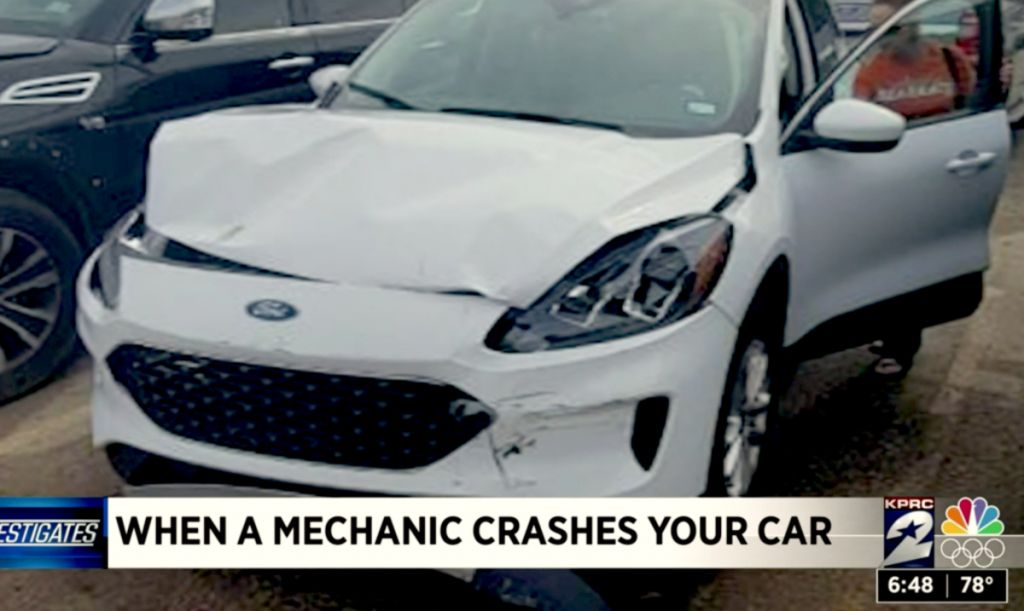 Wrecked Escape after service for "oil change."