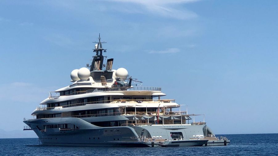 A large Yacht in the middle of the ocean.