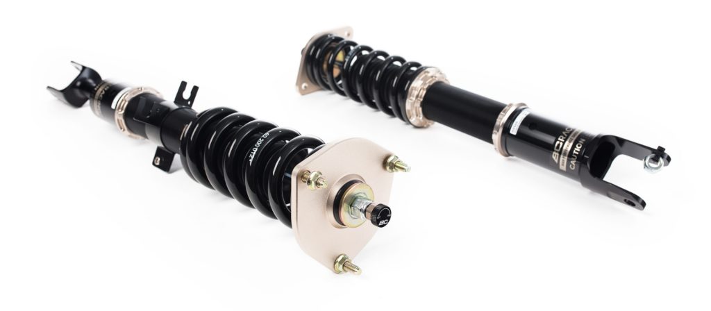 A black and gold set of BC Racing coilovers
