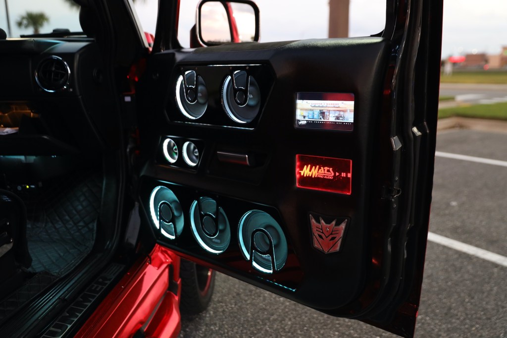  LEDs surround the speakers in the door of a custom Hummer.