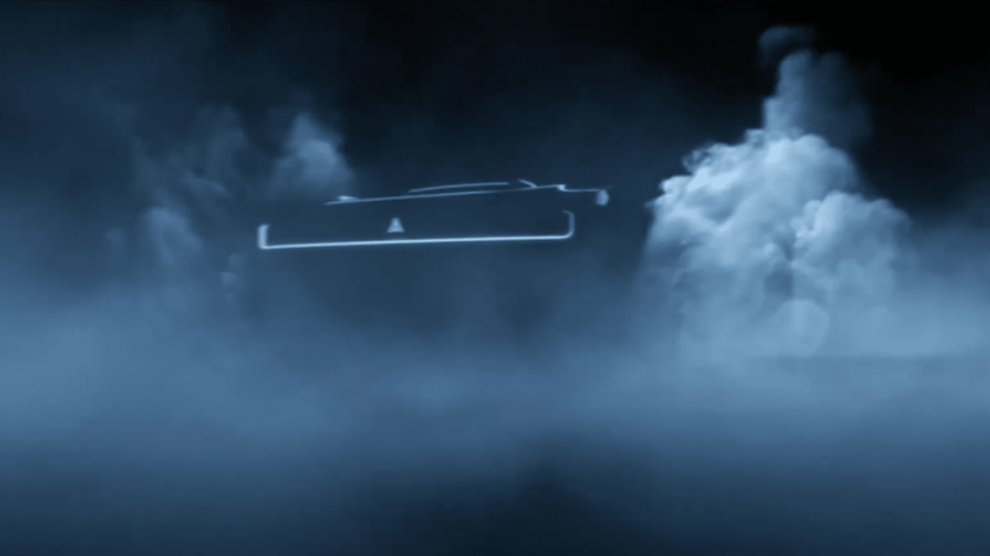 murky image of Dodge EV engulfed in tire smoke