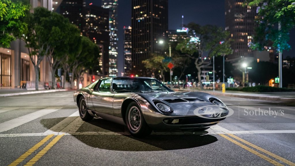 The front of the bare metal Miura, shot on a Los Angeles street at night