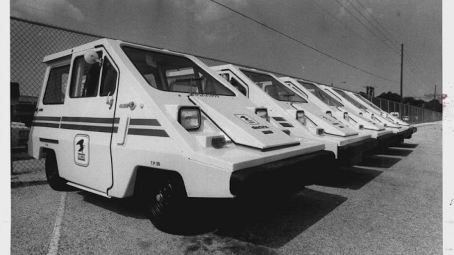 A fleet of ComutaCar Postal Vans