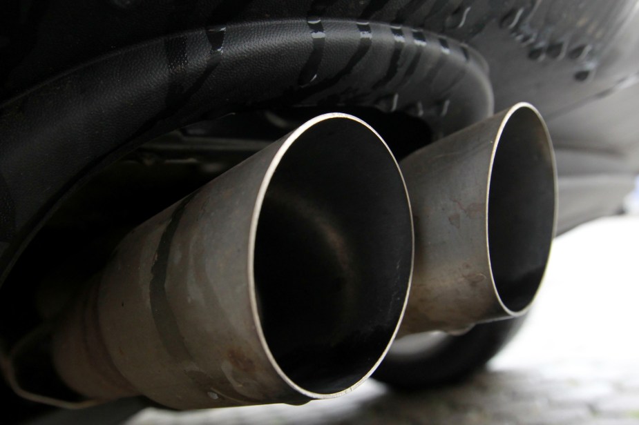 The exhaust pipes of a parked diesel car seen In Cologne.A