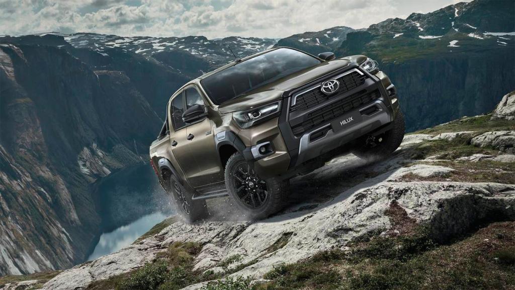 The 2020 Toyota Hilux climbing over rocks