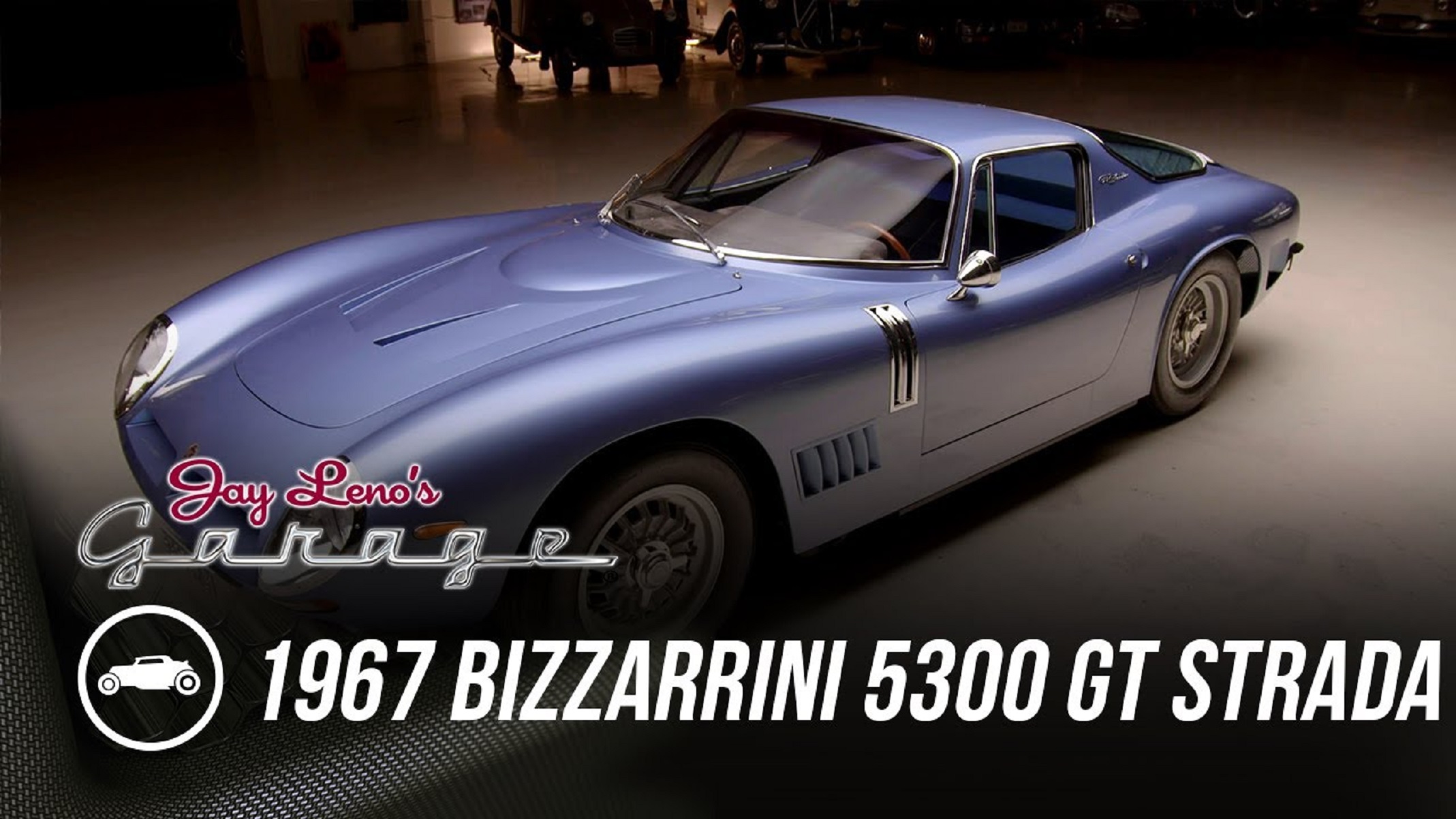 A blue 1967 Bizzarrini 5300 GT Strada in Jay Leno's garage
