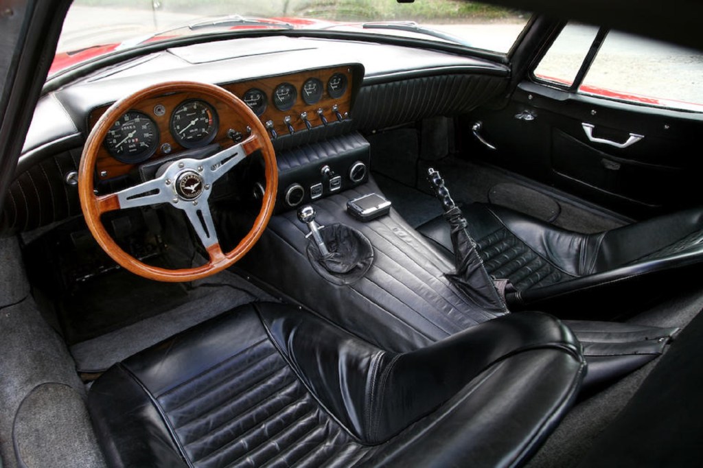 The black-leather-upholstered seats and dash of a 1968 Bizzarrini 5300 GT Strada