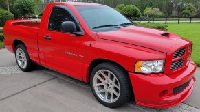 A red 2004 Dodge Ram SRT-10 on a driveway