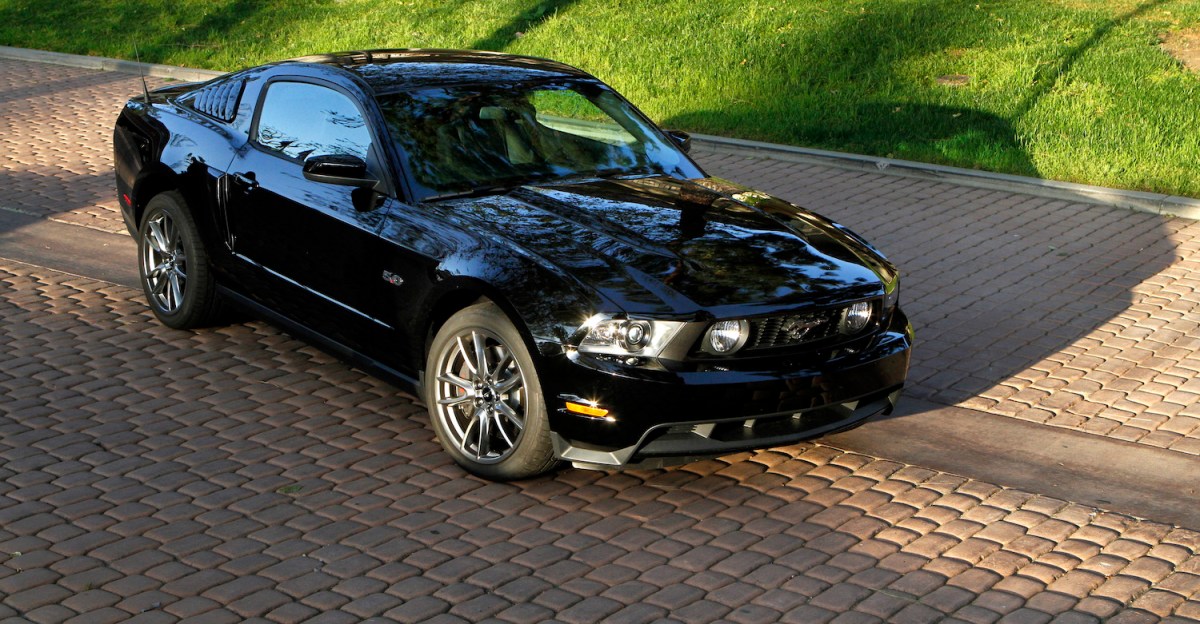 black 2011 mustang gt coupe parked outside