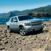 The 2012 Chevrolet Avalanche off-roading over rocks