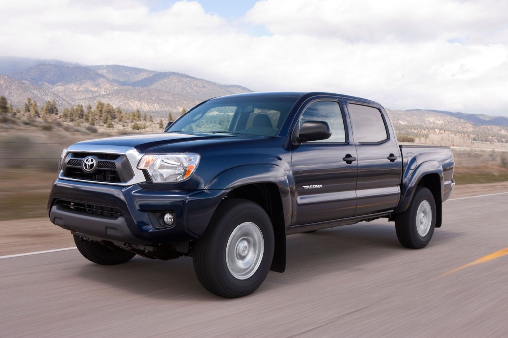 A 2015 Toyota Tacoma driving through the wilderness, the 2015 Toyota Tacoma is one of the best used trucks