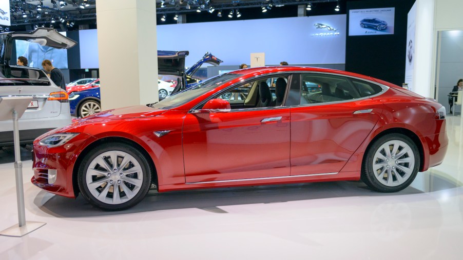 A red 2017 Tesla Model S at a car show, the Model S is one of the best used EVs