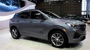A bluish gray metallic 2020 Buick Encore GX on display at the Chicago Auto Show in February 2020