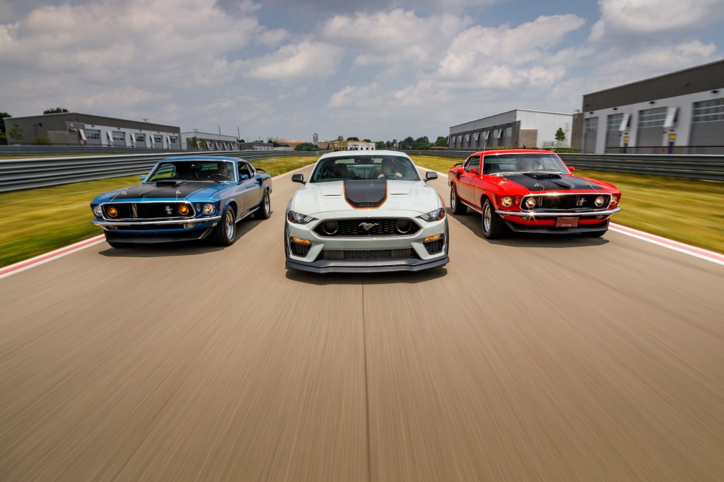After a 17-year hiatus, the 2021 Mustang Mach 1 fastback coupe (center) made its world premiere