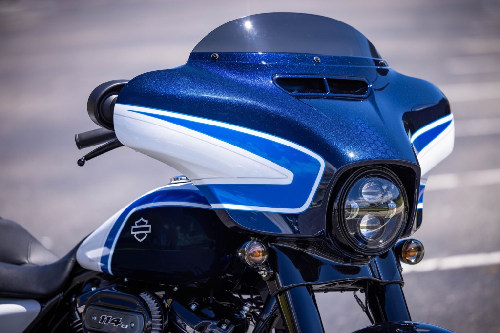 A close-up of the front fairing on a white-blue-and-black 2021 Harley-Davidson Arctic Blast Street Glide Special