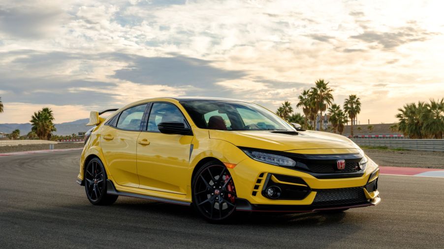 The 2021 Honda Civic Type R Limited Edition model in yellow parked on a racetrack