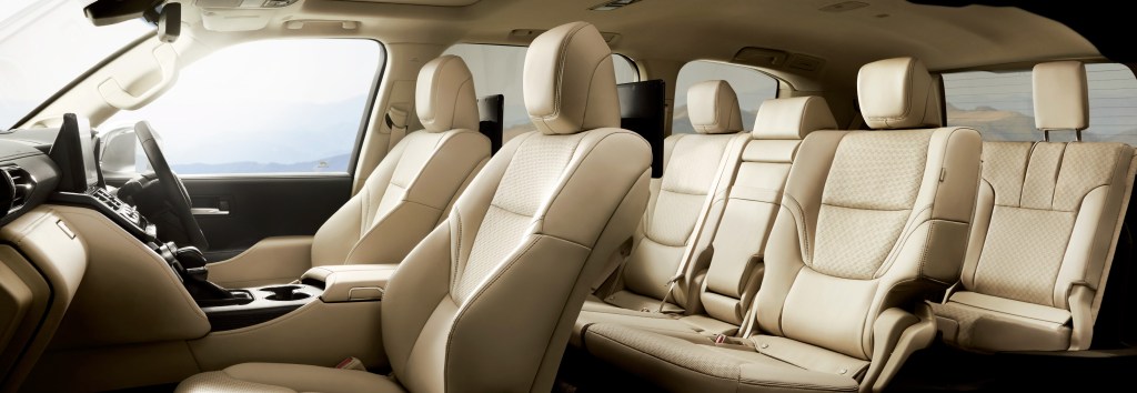 The 2022 Toyota Land Cruiser 300 Series luxury interior with rear entertainment in a creamy tan leather finish 