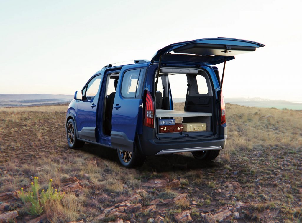 The fold-out cot in the back of the Rifter van
