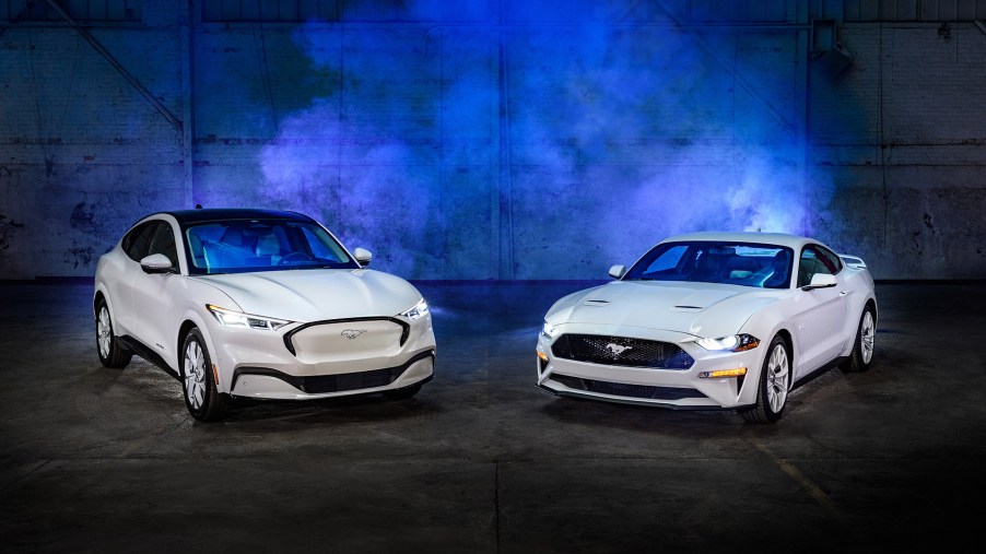 2022 Ford Mustang Mach-E (left) and 2022 Ford Mustang coupe (right) both cars feature the Ice White appearance package.
