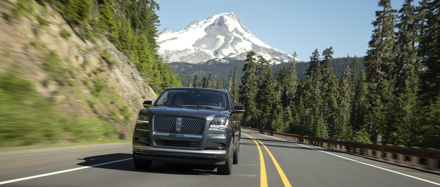 This is a 2022 Lincoln Navigator driving on the road with ActiveGlide