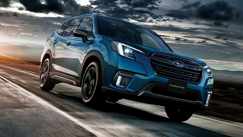 A 2022 Subaru Forester driving down the road