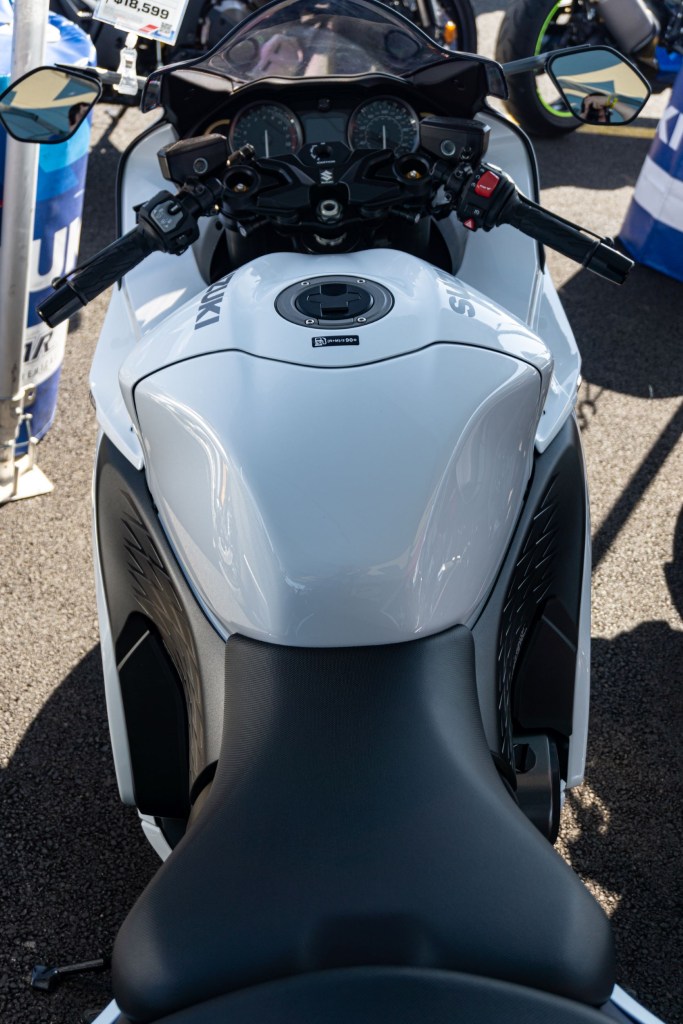 An overhead view of the front half of a white 2022 Suzuki Hayabusa
