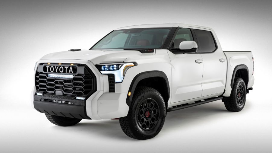A white 2022 Toyota Tundra on a white background with a black vignette.