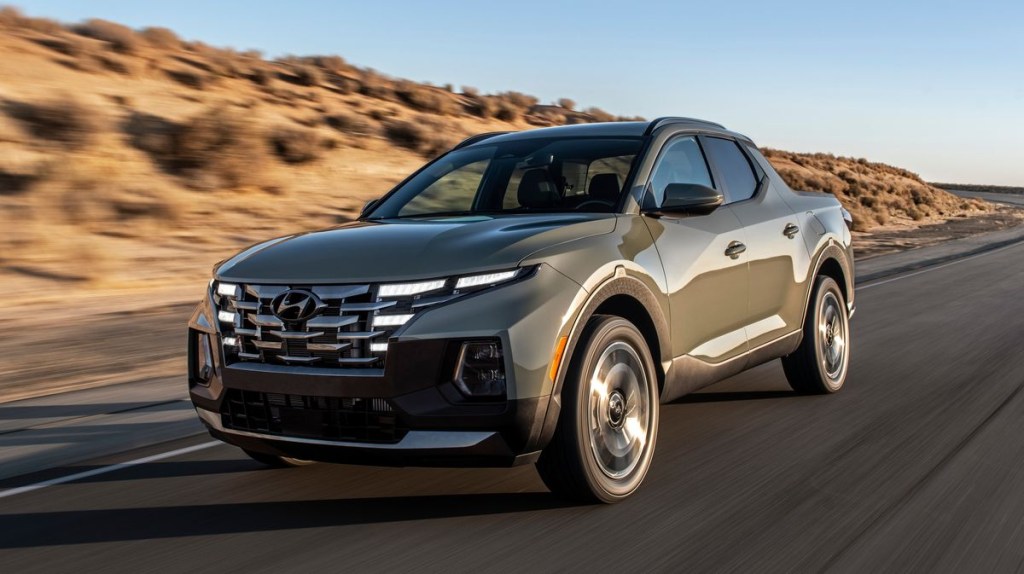 The 2022 Hyundai Santa Cruz driving down the road