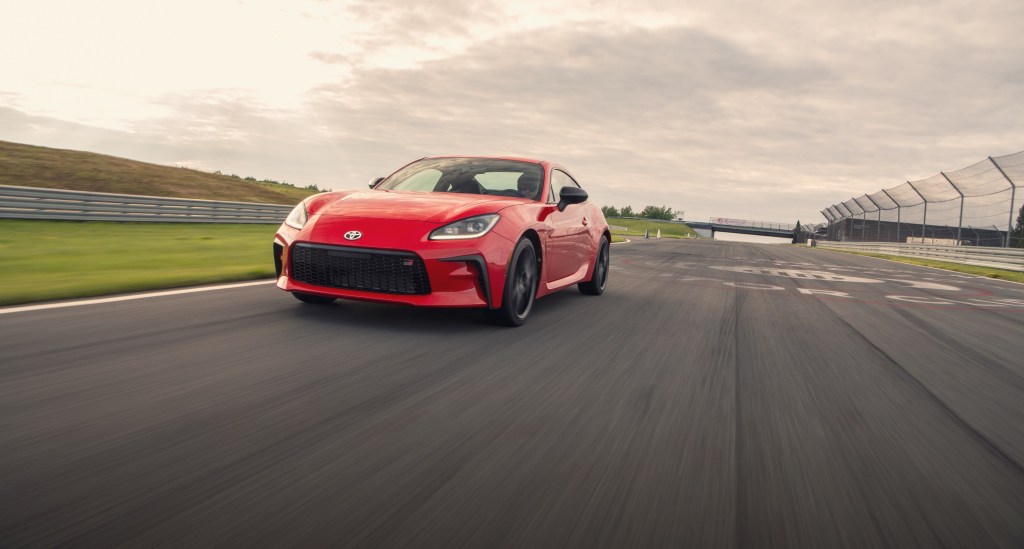 A red GR 86 on track during Toyota's launch event