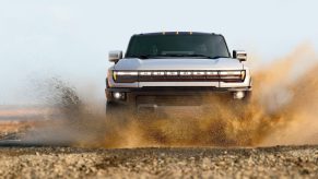 GMC's Hummer EV slams through mud