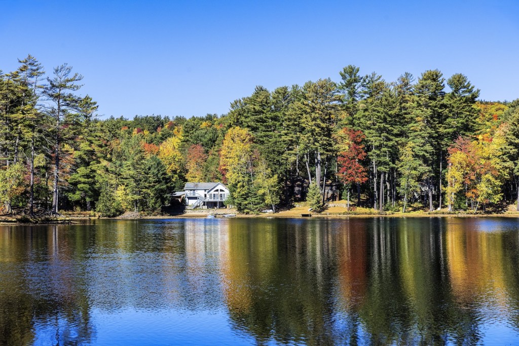 Autumn lake house on Lake Luzerne in the Adirondack mountains
