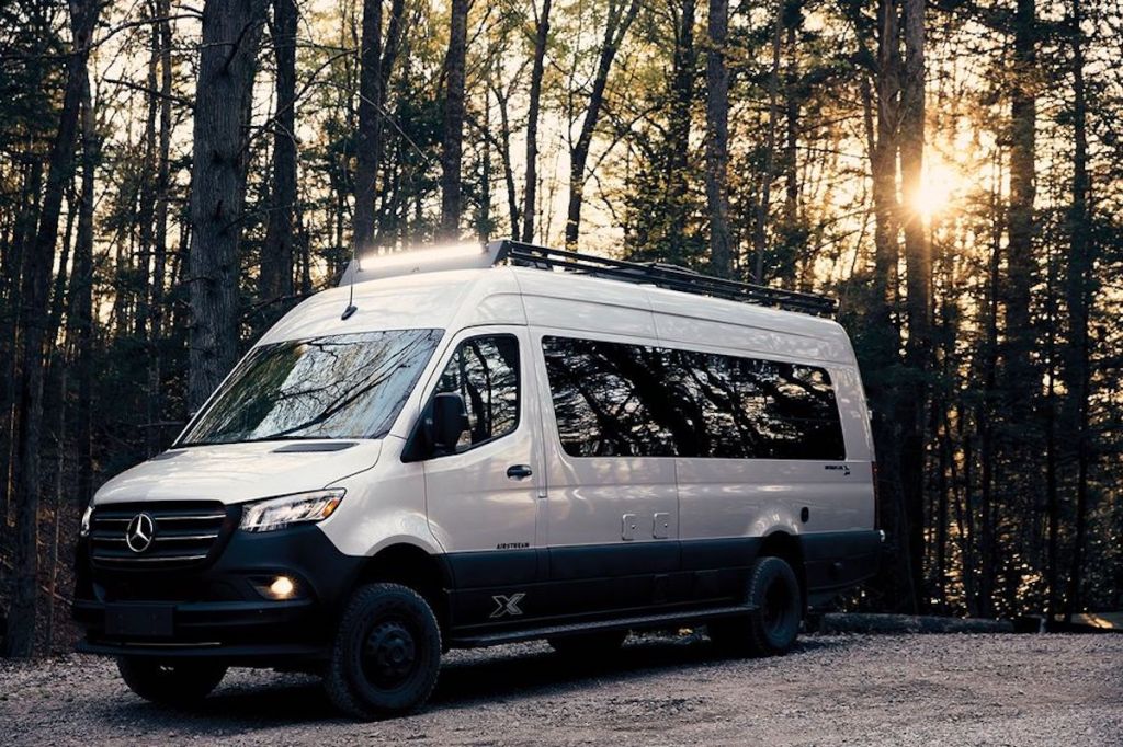 The new Airstream Interstate 24X camper van parked in the woods 