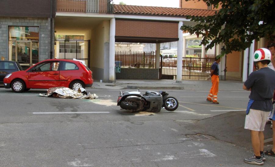 The body of Andrea Pininfarina, CEO of the famed Italian car design firm, lies in the street after he died in an car accident in Italy in August 2008