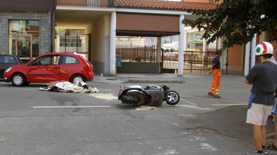 The body of Andrea Pininfarina, CEO of the famed Italian car design firm, lies in the street after he died in an car accident in Italy in August 2008
