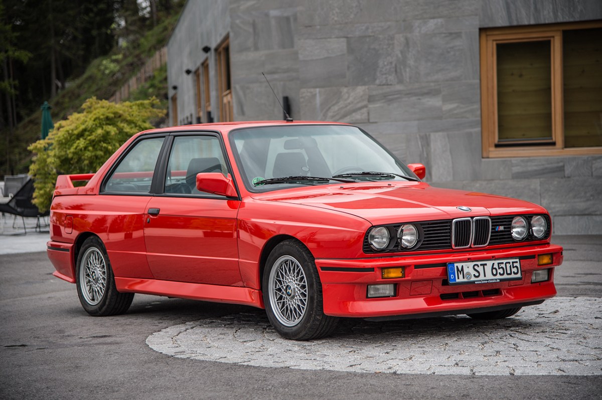 A red BMW M3 E30 generation.